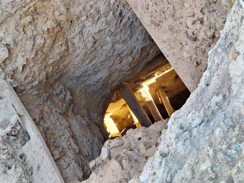 This is looking down a stope from one of the lower levels. They chased the ore all the way to the surface. That is sunlight you see down there. It is coming through the open cut.